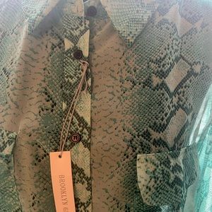 Beautiful green snakeskin blouse. Never worn. NWT. Great for a night out.